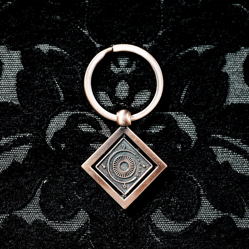 Darrington Press | Candela Obscura : Spinning Keychain